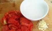 Приготовление блюда по рецепту - жареный баклажан с томатом. Шаг 3