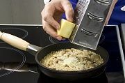 Приготовление блюда по рецепту - Ризотто с грибами и луком. Шаг 8
