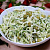 Салат с капустой, зеленым горошком и яйцом