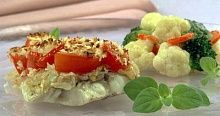 Рецепт - Треска, запеченная с помидорами