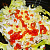 Новогодний салат из крабовых палочек и кальмаров «Морской каприз» украшенный икрой